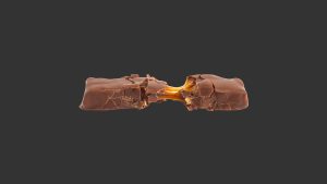 Chocolate bar isolated on a black background.